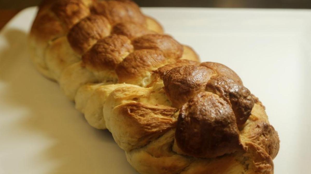 Challah, or braided egg bread, symbolizes the sustaining of the Jews in the wilderness, Rabbi Wirtschafter said. The sweet bread is fun for kids to make.