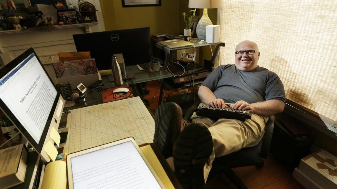 Author Christopher Rowe at his home in downtown Lexington. His book of short stories, “Telling The Map,” is getting positive reviews nationally.