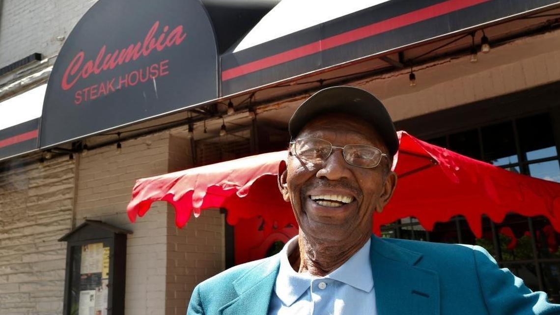 James “Smitty” Smith in front of Columbia Steak House, 201 North Limestone. Smitty was the longtime maitre d’ at Columbia and at Smitty’s in Chevy Chase. He now works for the sheriff’s department at circuit court.