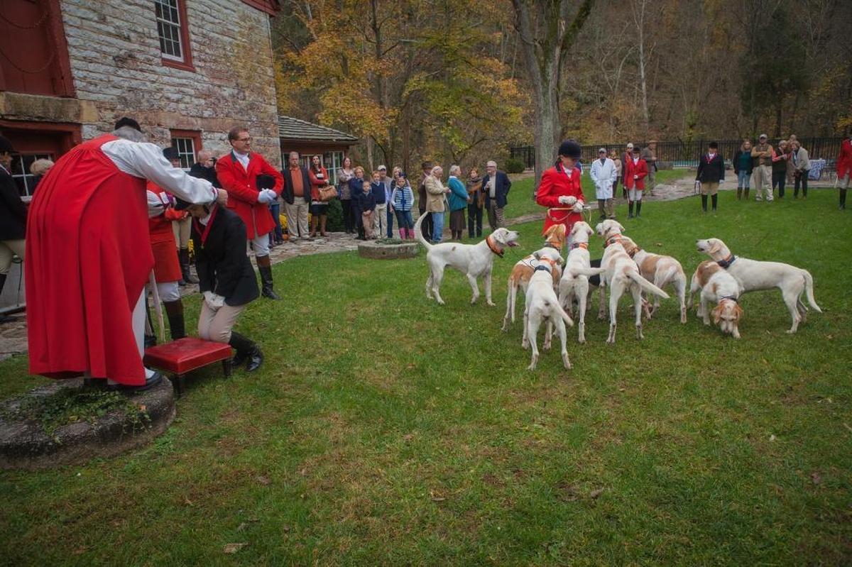 Rev. Bruce Caldwell of the Episcopal Bishop Provisional of Lexington placed blessed medallions of Saint Hubert, the patron saint of hunting, on riders at the Iroquois Hunt Club.