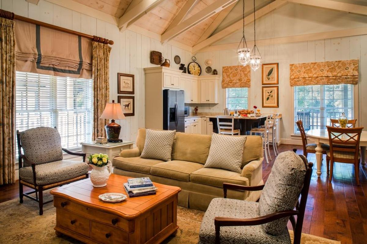 One of the 36 spacious cottages at Barnsley Resort, Adelaide offers five bedrooms, as well as a great room with a dining area and wood-burning fireplace.
