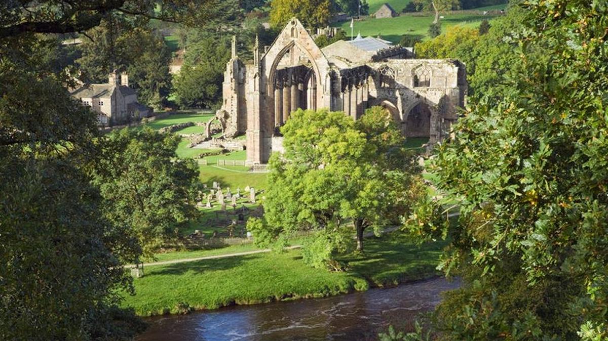 The Priory Ruins on the banks of the River Wharfe at Bolton Abbey in the Yorkshire Dales National Park.