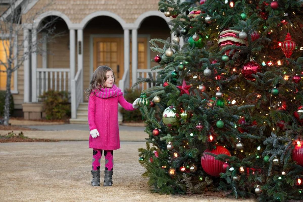 Madison Stiles from Cartersville, Ga., admired one of the holiday trees at Barnsley Resort.