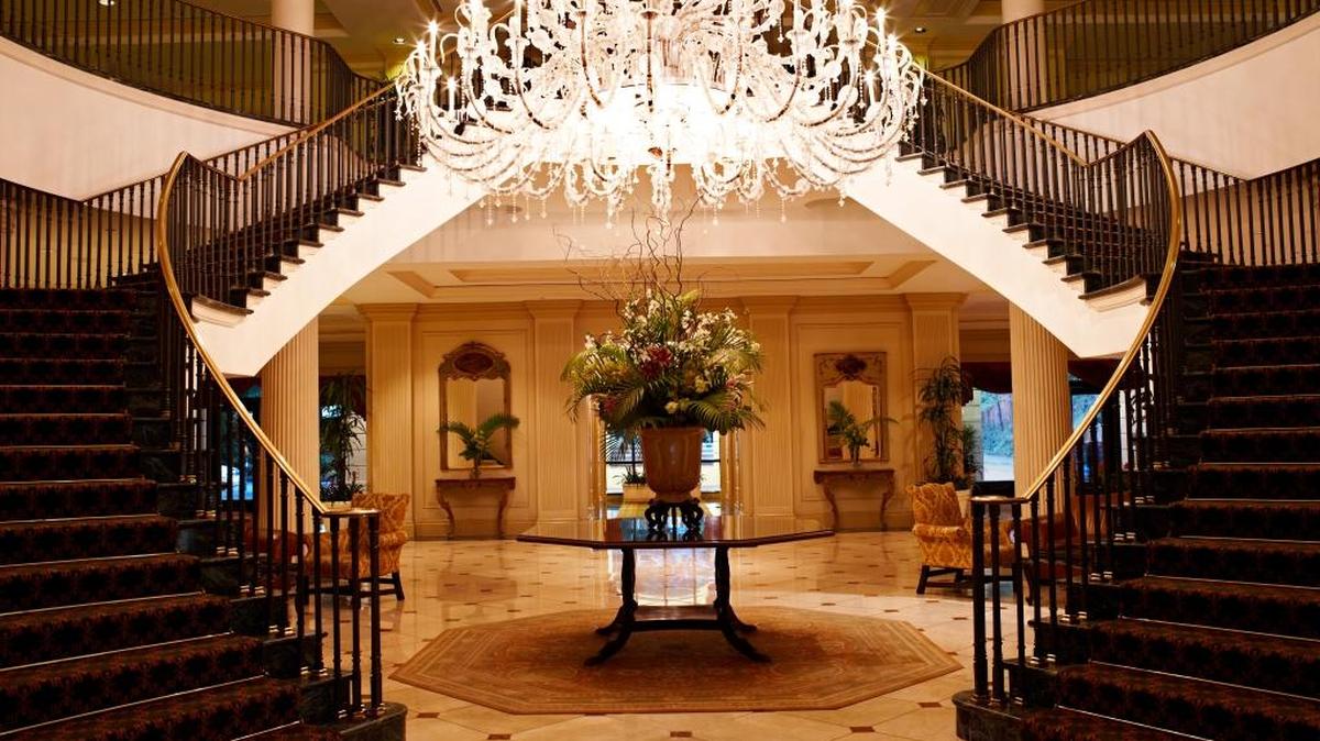 Charleston Place’s ornate lobby with its grand staircase and 12-foot chandelier reflects the grandeur of the city itself.