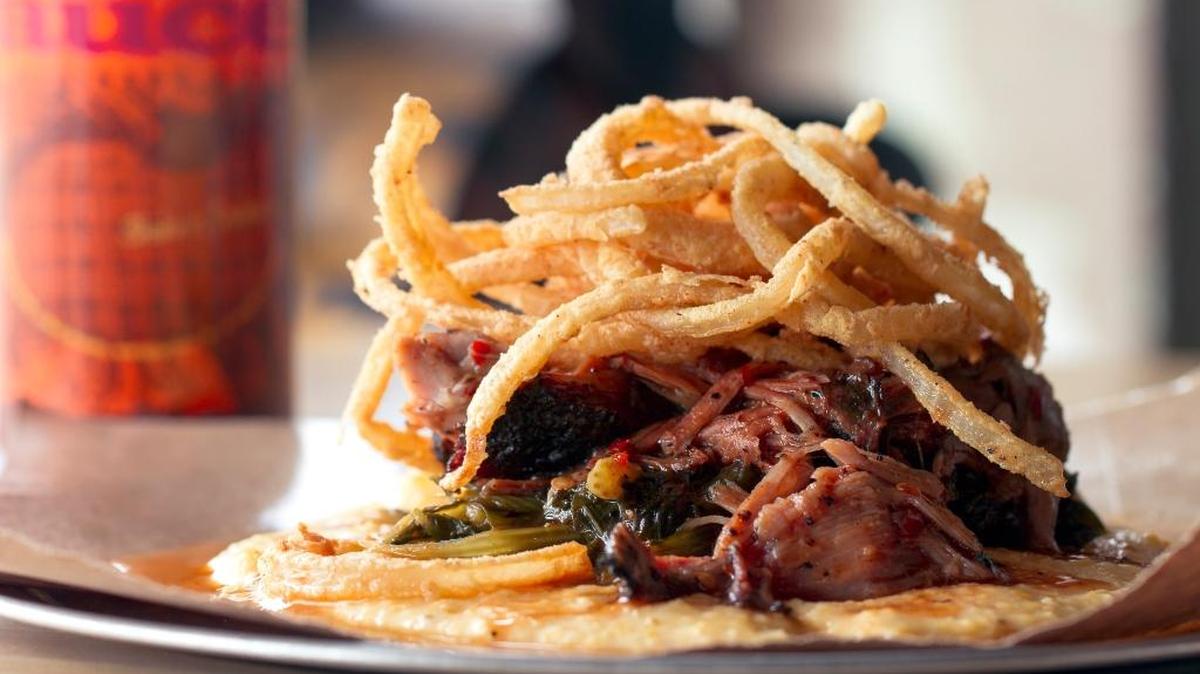 At SAW’s Soul Kitchen in Birmingham, Ala., the pork and greens are on the list of “100 Dishes to Eat in Alabama Before you Die.”
