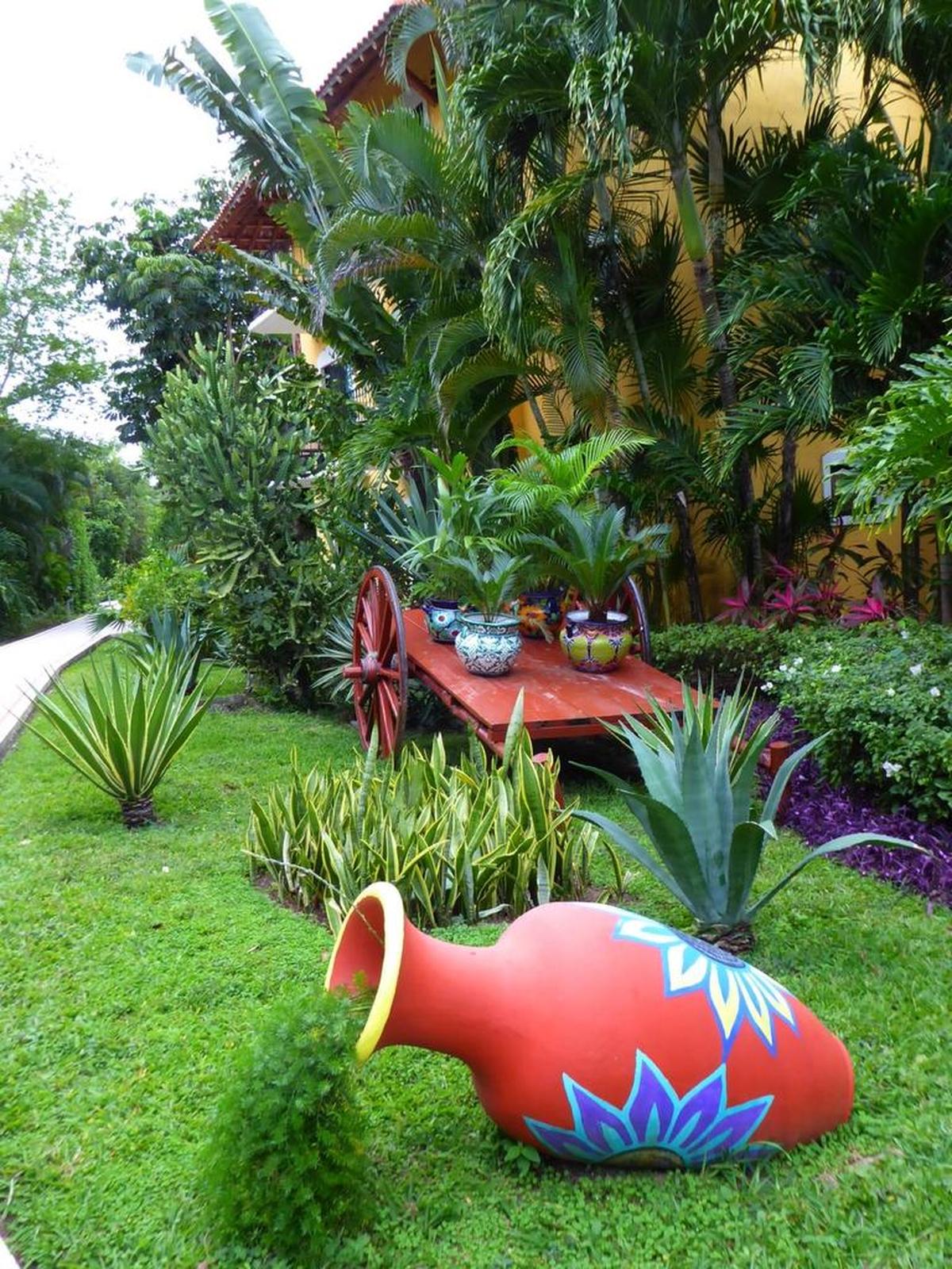 Mexican pottery adds a colorful touch to the landscaped grounds of the Occidental Cozumel Resort.