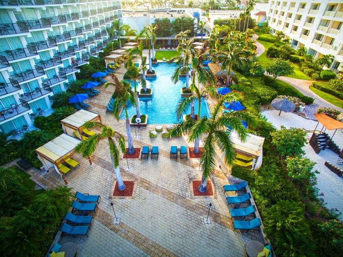 The adults-only H2Oasis pool features a long strip for swimming laps and alcoves on the sides for relaxation. The pool is surrounded by cabanas and relaxation areas and also has a bar with daily 2-for-1 happy hour specials.