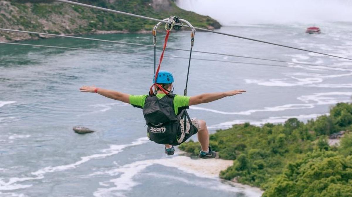 A tourist rode a zip line toward Horseshoe Falls on the Ontario side of Niagara Falls. That zip line can reach speeds of 40 mph.