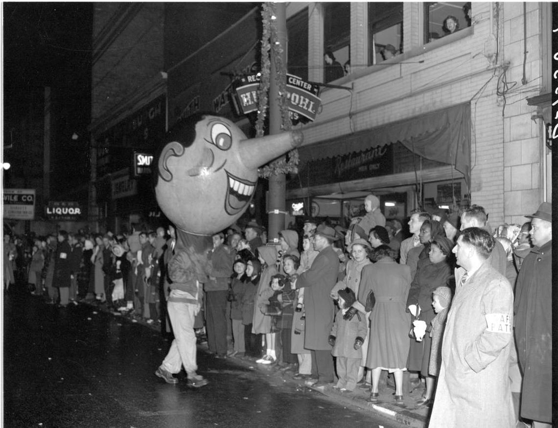 The Lexington Herald reported that 100,000 people braved a cold rainy night on December 1, 1949 to watch the downtown Christmas Parade. Police reported that the parade route from Third and Midland through Main Street to West Second and Broadway was packed solid.