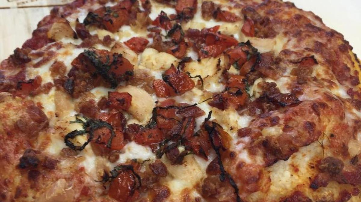 Lexington Pasta Garage is adding six-inch pizzas to the menu, available in cheese, pepperoni, daily veggie or gourmet specialties such as this one.