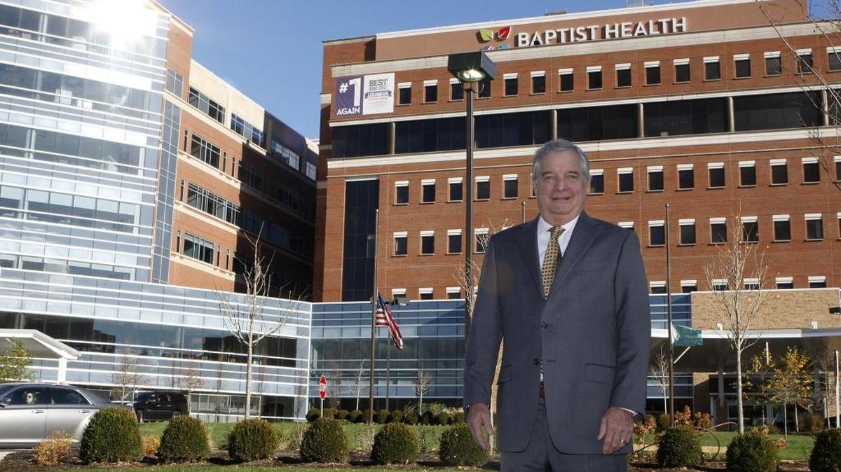 William Sisson, president and CEO, stood in front of the new facilities which include the shiny North tower at left, at Baptist Health Lexington on Thursday, November 19, 2015.