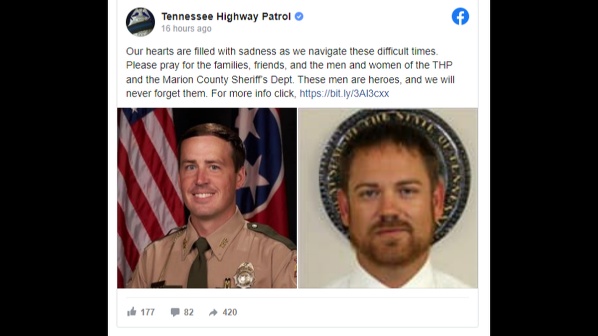 Two law enforcement officers died when their helicopter hit power lines near a Tennessee interstate and crashed into the woods of Aetna Mountain. 