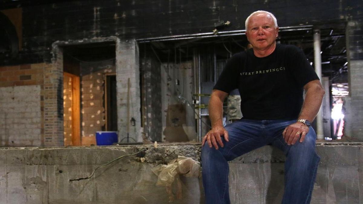 Tom Behr, owner of Pazzo's, Village Idiot and The Beer Trappe, posed last August for a picture inside of what will soon be the Bear & the Butcher restaurant. Photo by Andrea Noall | Staff