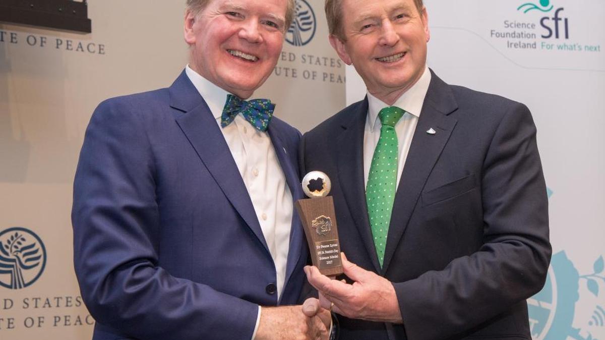 Taoiseach Enda Kenny, right, presents The Science Foundation Ireland St. Patrick's Day Science Medal 2017 to Pearse Lyons, president of Alltech, at the United States Institute of Peace.