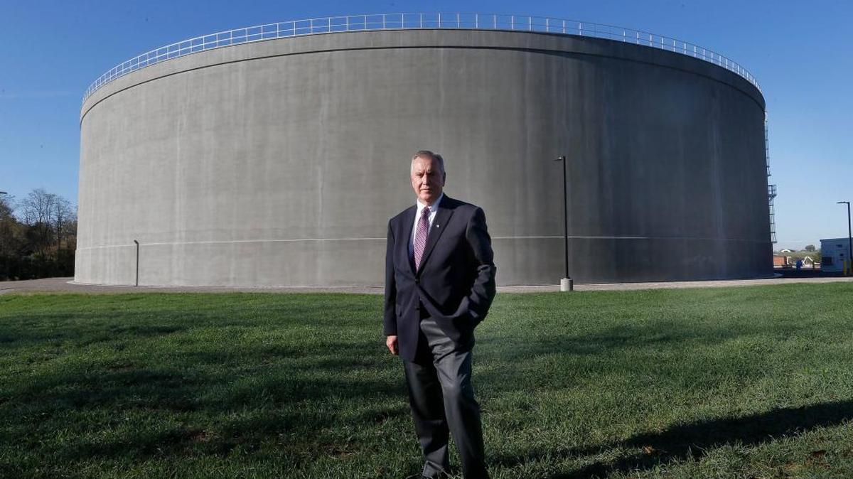 Ron Gilkerson, president of GRW, photographed by the new 22 million gallon Town Branch Wet Weather Storage tank in Lexington. GRW designed the tank.