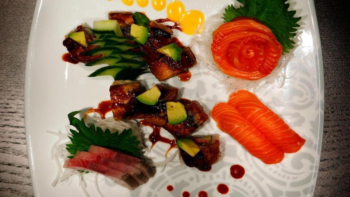 The menu at the new School Sushi will be much the same as the former restaurant of the same name, but it won’t have a conveyor belt to deliver sushi. In this 2009 file photo, assorted appetizers included, from bottom left, yellow tail sashimi, dragon roll, salmon sashimi (flower-like), and salmon nigiri.