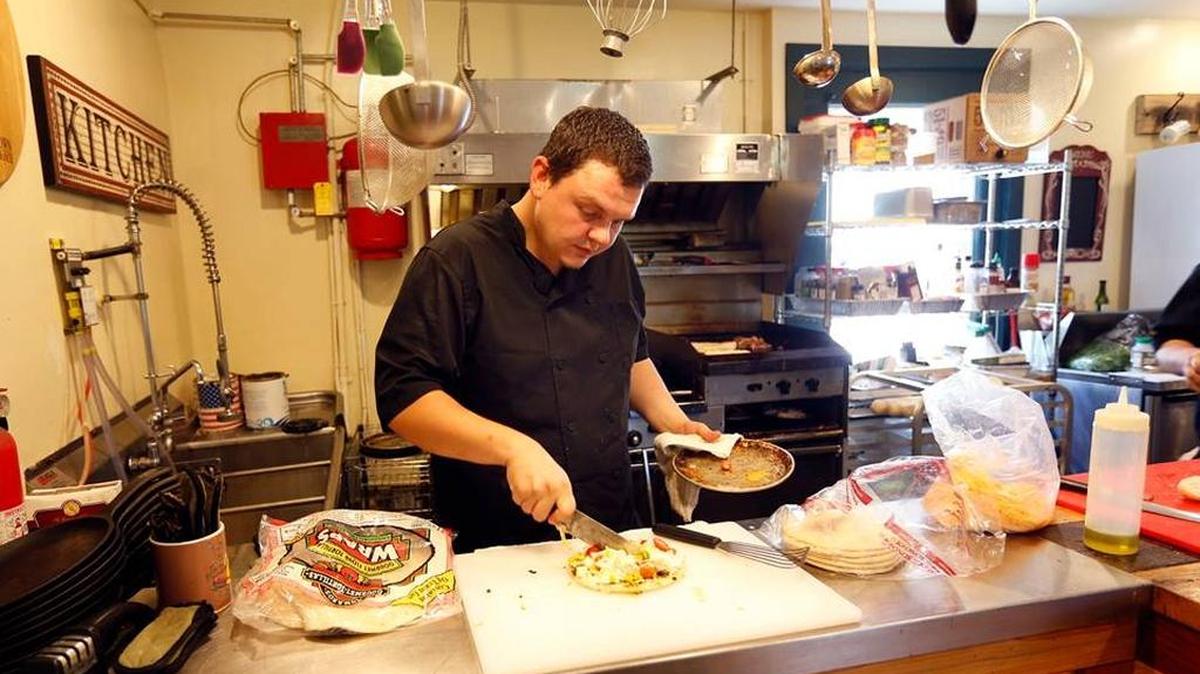In this 2014 file photo, chef Craig de Villiers worked at Graze restaurant in Winchester. He plans to open a second Graze in Lexington on South Limestone in late October. He’ll serve dinner only at first and have a select bar.