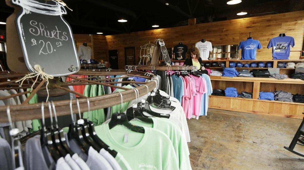 Karen Faigle of Covington browsed through the gift shop at Kentucky Mist moonshine distillery in Whitesburg, Ky., on Oct. 27, 2015.