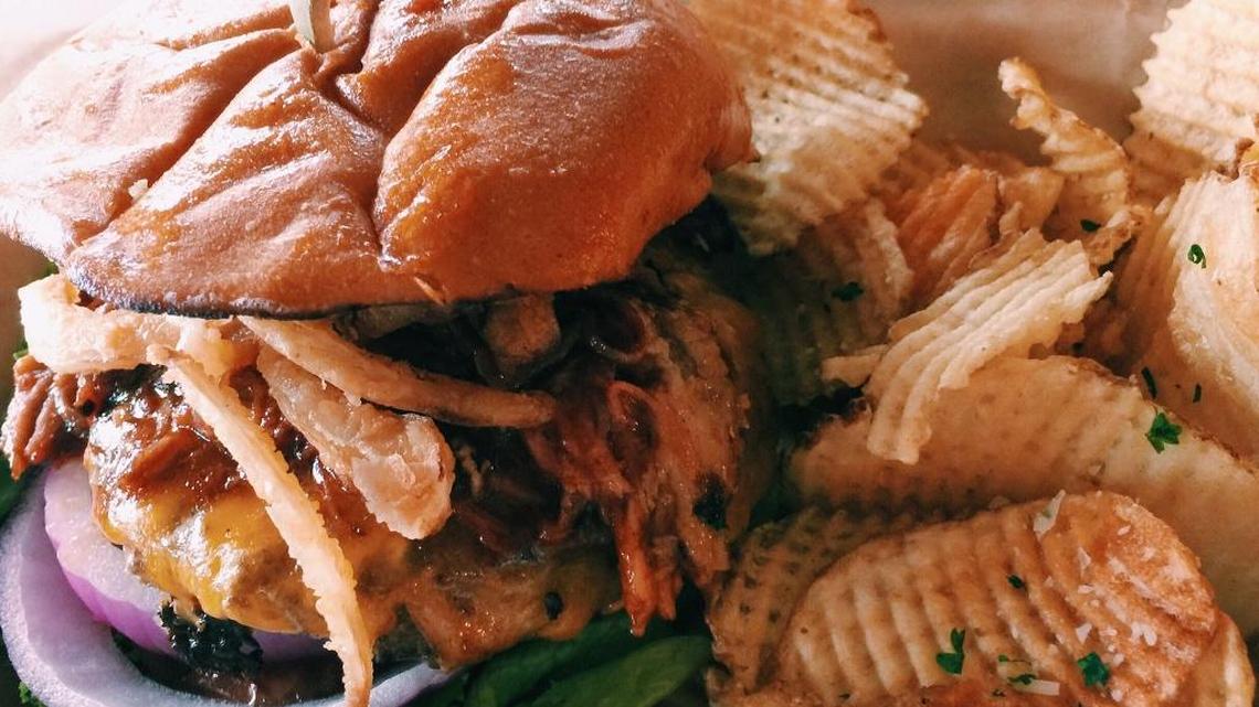 The Duke sandwich, with pulled pork, aged cheddar, crispy onions and barbecue sauce, is on the menu at Jax Burgers & Brews, a new restaurant at Lexington Green.