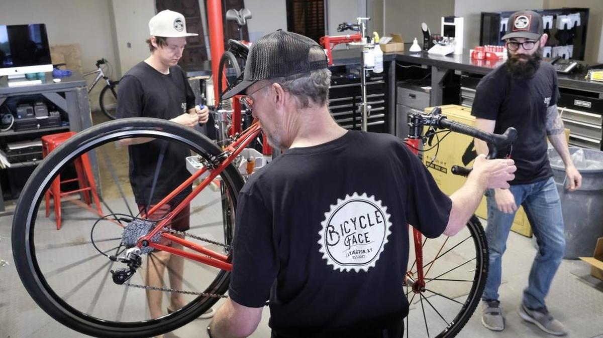 The staff of Bicycle Face, a new bicycle shop at 333 E. Short St. in Lexington: Taylor Stull, left, Robert Brandon and manager Jack Baugh. The three have a combined total of nearly 50 years of experience as professional bike mechanics.