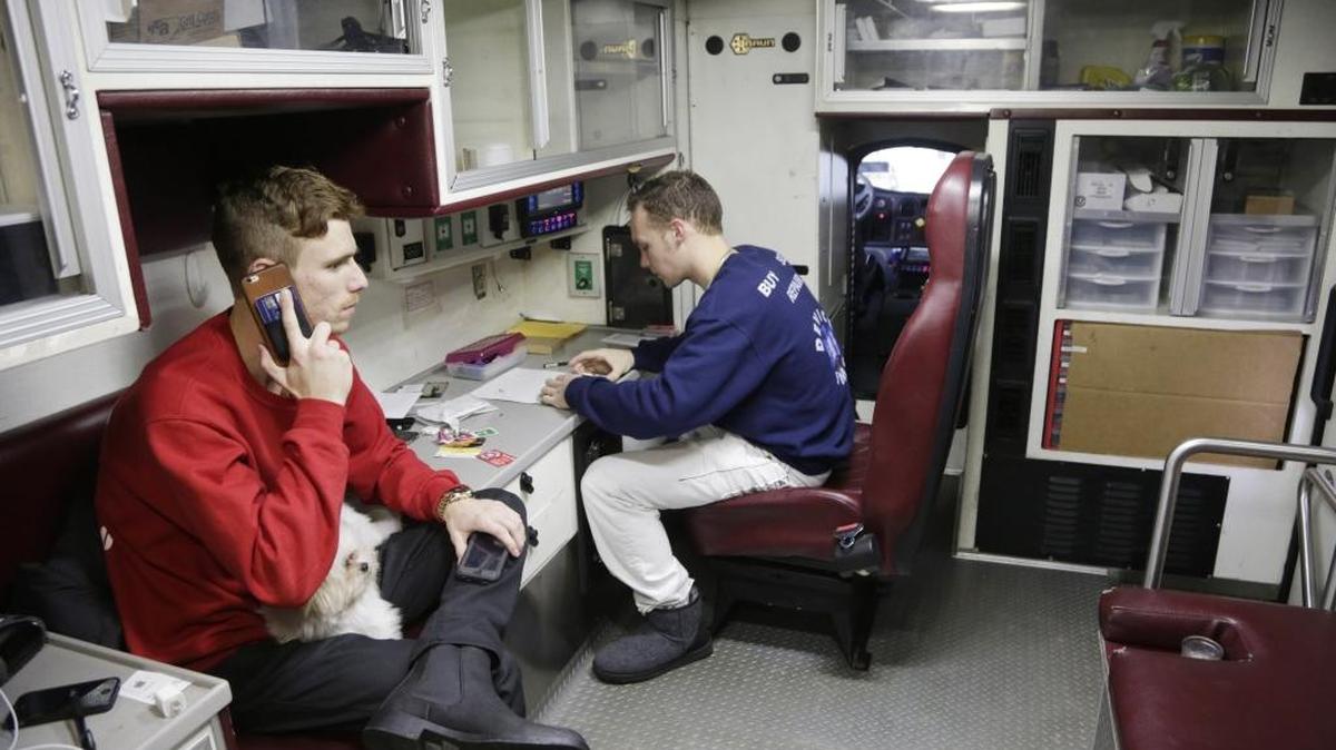 Alex Orr repaired a smartphone while Hunter Fryman, left, took a repair order in Lexington. The two founded Device EMS in late 2015.
