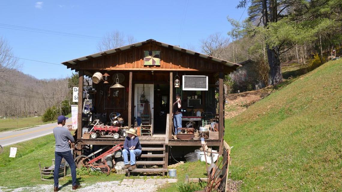 Delana Banks outside her shop with her husband, Bob Banks. He built the shop for her. Her other shop is in his childhood home.