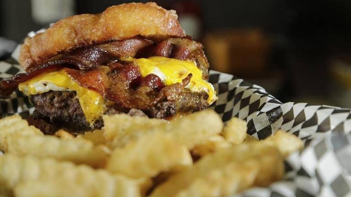 The Spalding burger at Bad Wolf Burgers is a cheeseburger with bacon and egg, served on a Spalding doughnut.