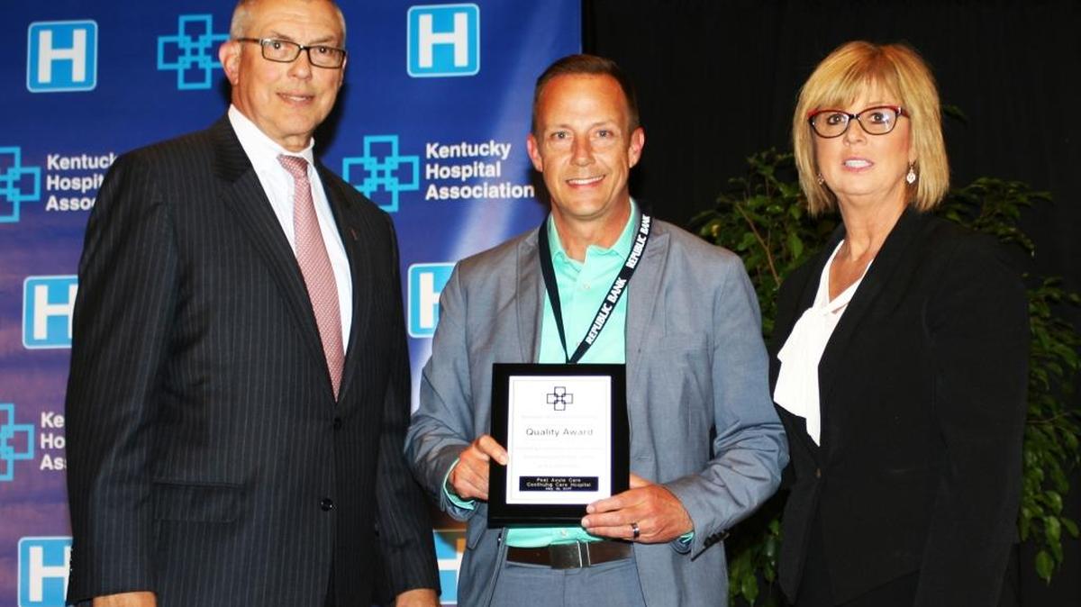 From left, Michael T. Rust, Kentucky Hospital Association president, Jimmie Settles, interim president and CEO, Continuing Care Hospital, and Susan Starling, chair of KHA Board of Trustees.