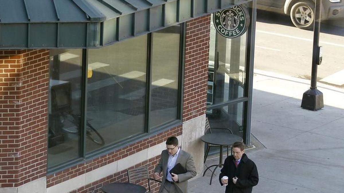 The Starbucks at West Main Street and Broadway has closed for renovation, but a temporary Starbucks is to open inside the same building in about two weeks. Lexington Mayor Jim Gray, at right, with chief of staff Jamie Emmons, is a regular customer.