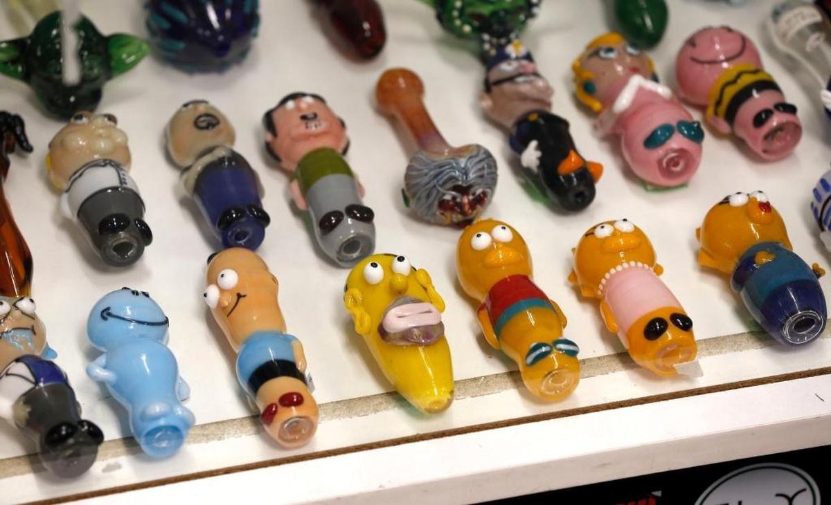 Pipes for sale at Botany Bay at 420 New Circle Road in Lexington. The state drug enforcement office says as long as they’re keeping within the minuscule limits of active chemical allowed in products such as gummies, water and cannabinoid-infused coffee, they can sell it.
