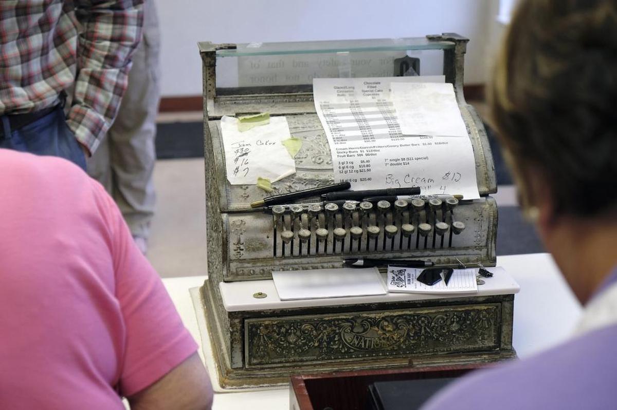 The bakery’s old cash register, which Bowman J. Spalding bought used in 1935, is a link to the bakery’s beginning.