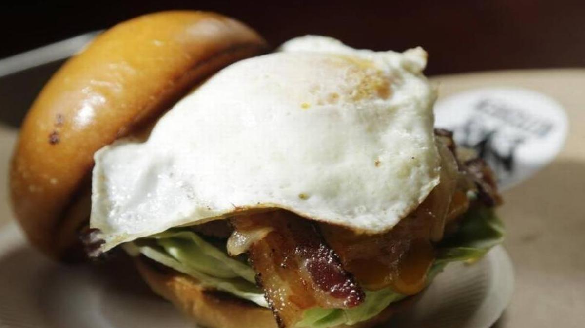The menu at DV8 Kitchen features items such as this bacon, egg and cheese sandwich with homemade brioche buns.