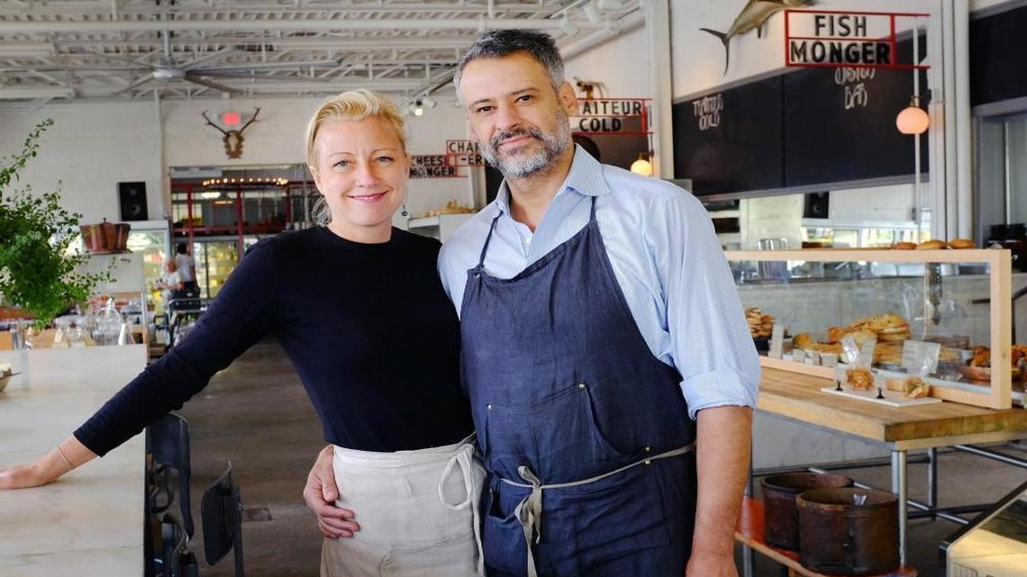 National Provisions owners Andrea Sims and Krim Boughalem, who are married, posed in their market space, which opened May 21, 2013, and completed the buildout of their facility, which also includes a bakery, restaurant and beer hall.