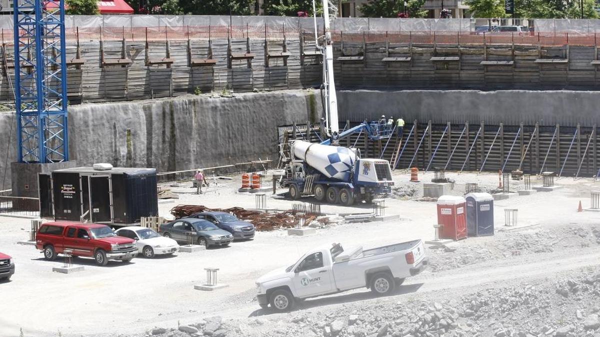 Construction continued Monday afternoon at the CentrePointe site on West Main in Lexington. Concrete was being poured to begin to building the walls.