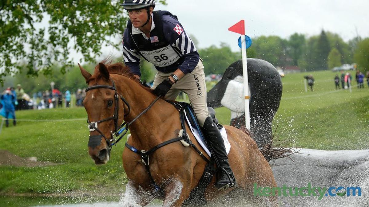 Boyd Martin on Blackfoot Mystery splashed out of the Creekside Cabin during the cross country ride of the Rolex Kentucky Three Day Event at the Kentucky Horse Park. The state announced Tuesday it is conducting an audit of the Horse Park.
