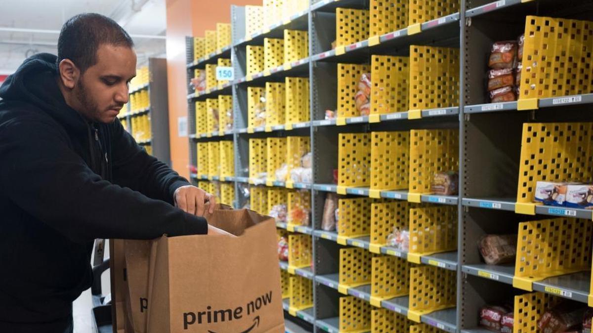 Amazon has announced the 20 metropolitan areas that are finalists in the competition for the company’s second headquarters. In this 2017 file photo, a clerk filled a customer order at an Amazon Prime warehouse in New York.