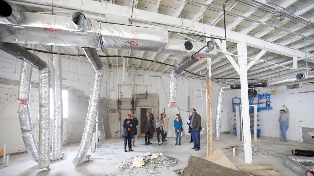 In April, Chad Walker showed several area business owners the inside of 740 National Avenue in Lexington. National Avenue is blooming again, with The White Dress of Lexington moving into 740 National along with some other businesses.