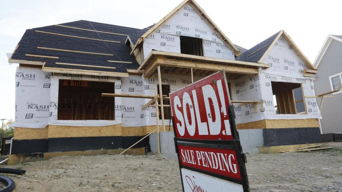 For a variety of reasons, roughly 20% of all sales fall through. Above: A house under construction with a pending sale sign in the front yard. 