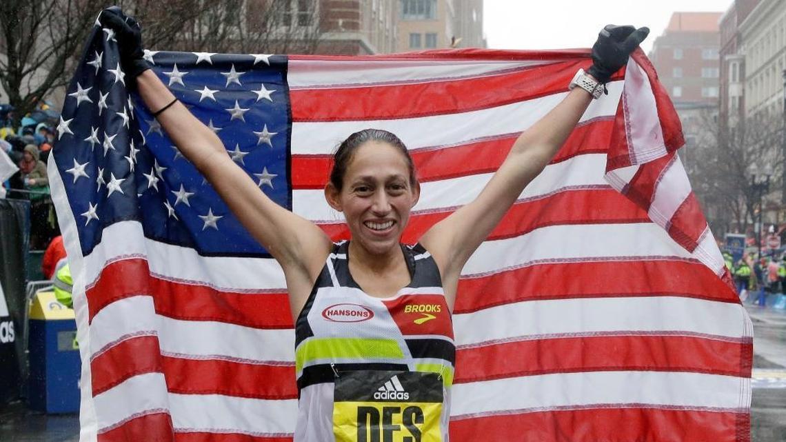 Desiree Linden, of Washington, Mich., celebrates after winning the women's division of the 122nd Boston Marathon on Monday, April 16, 2018, in Boston. She is the first American woman to win the race since 1985. (AP Photo/Elise Amendola)