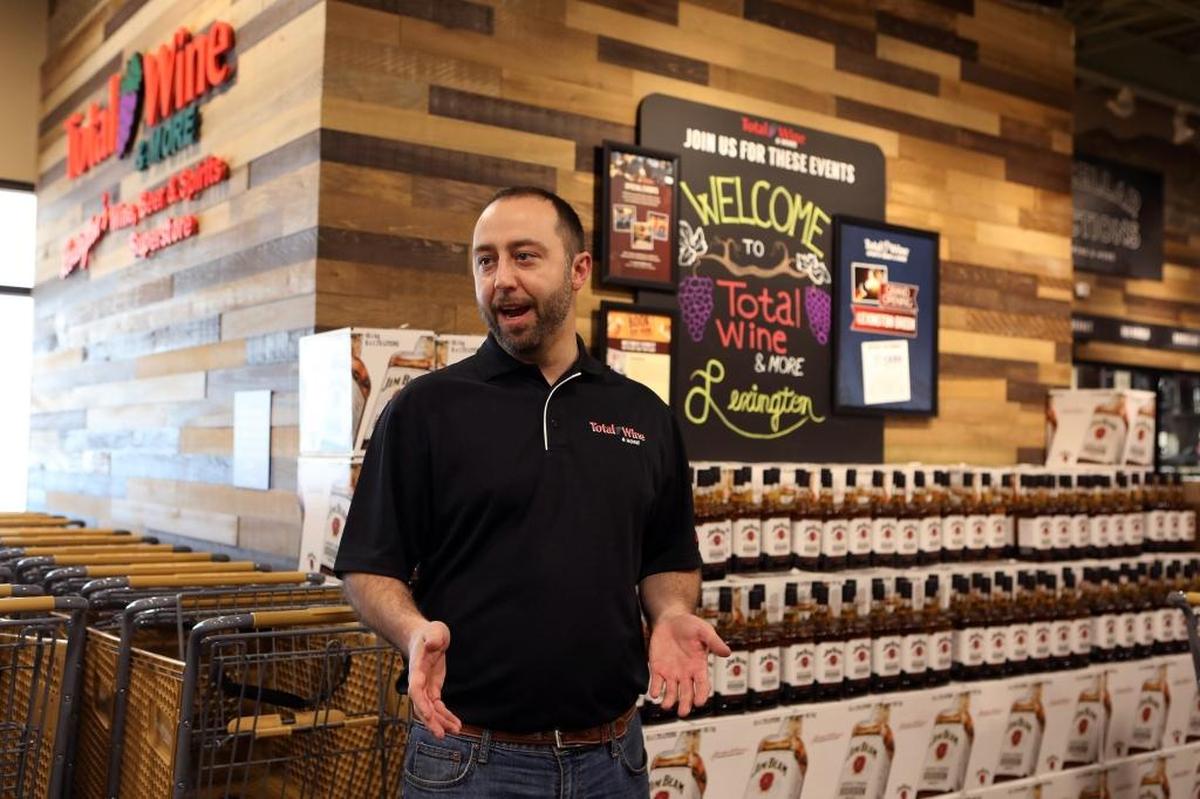 Store manager Derick Wright said Total Wine and More’s policy is to match or beat the lowest price, which in Kentucky can mean selling at cost. But he said they also focus on customer service.