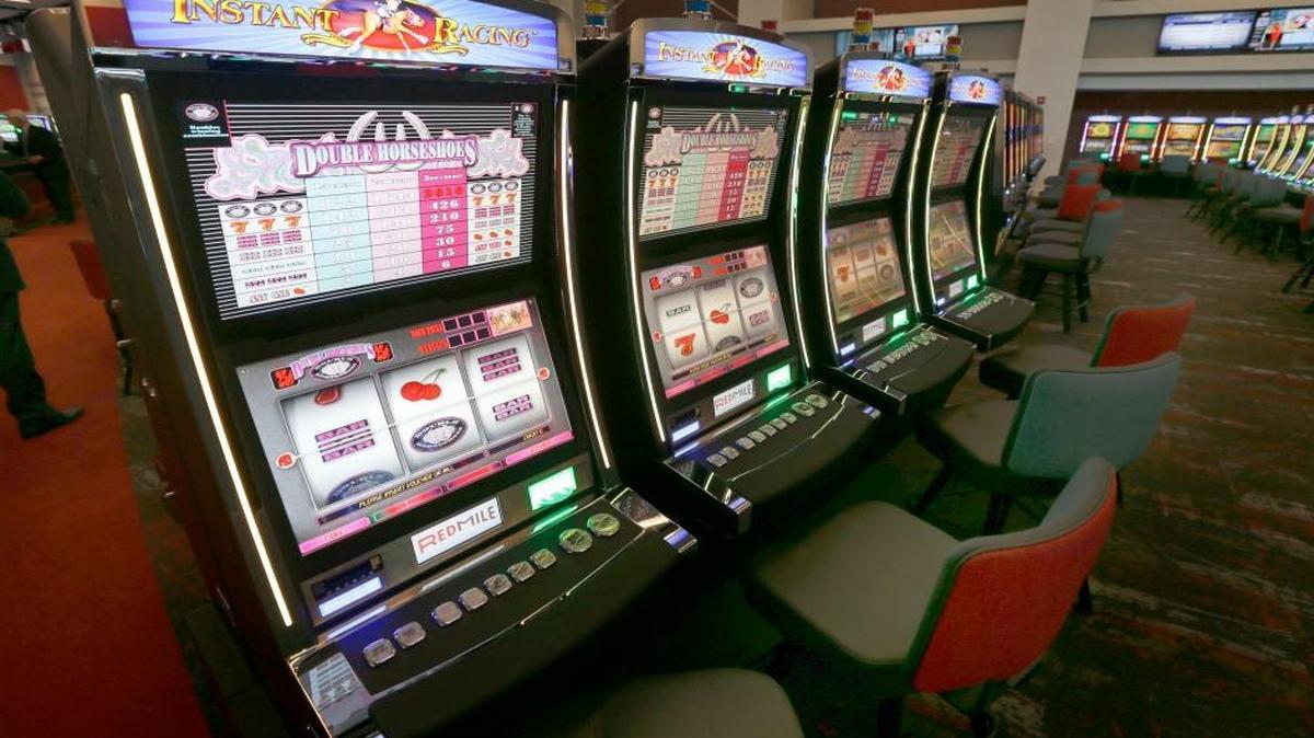 The Kentucky Horse Racing Commission reported Tuesday that the Red Mile gambling parlor showed marginal gains in September with the handle up slightly to $21.1 million. This 2015 file photo shows the instant racing machines in Lexington’s first legal gambling parlor at Red Mile.