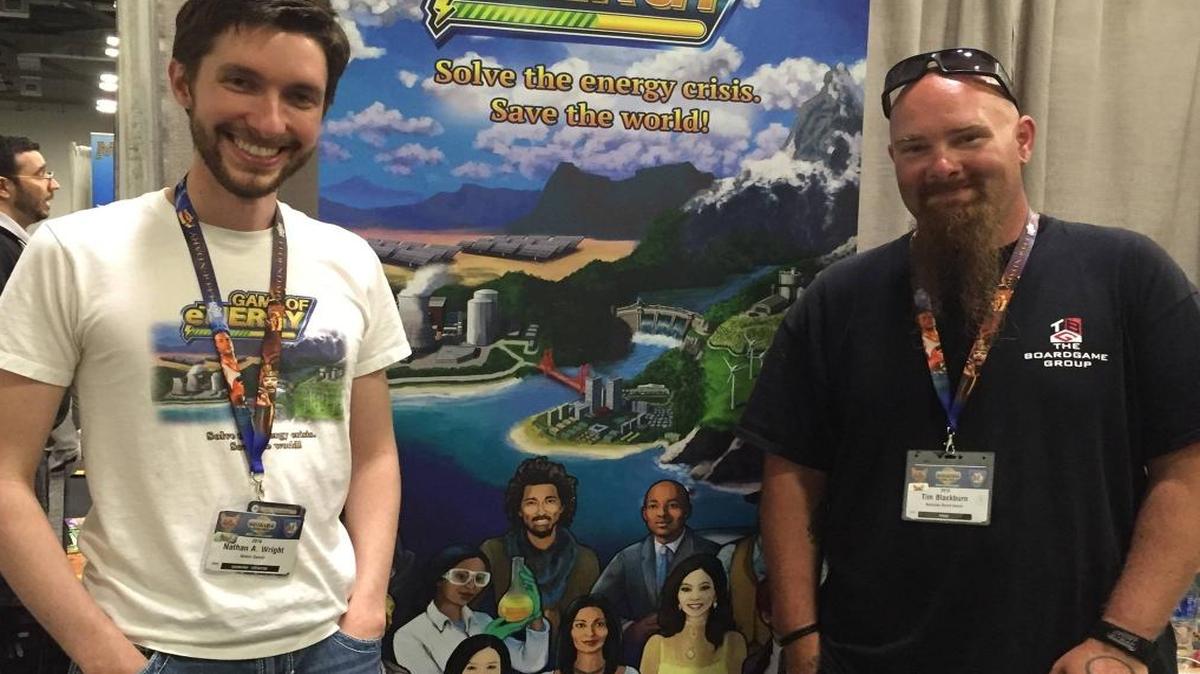 Nathan Wright, left, with Tim Blackburn, a Kentucky Bored Gamer and a tabletop game reviewer. Wright said Blackburn loved the Game of Energy so much he agreed to demo the game at Origins Game Fair in Columbus, Ohio.