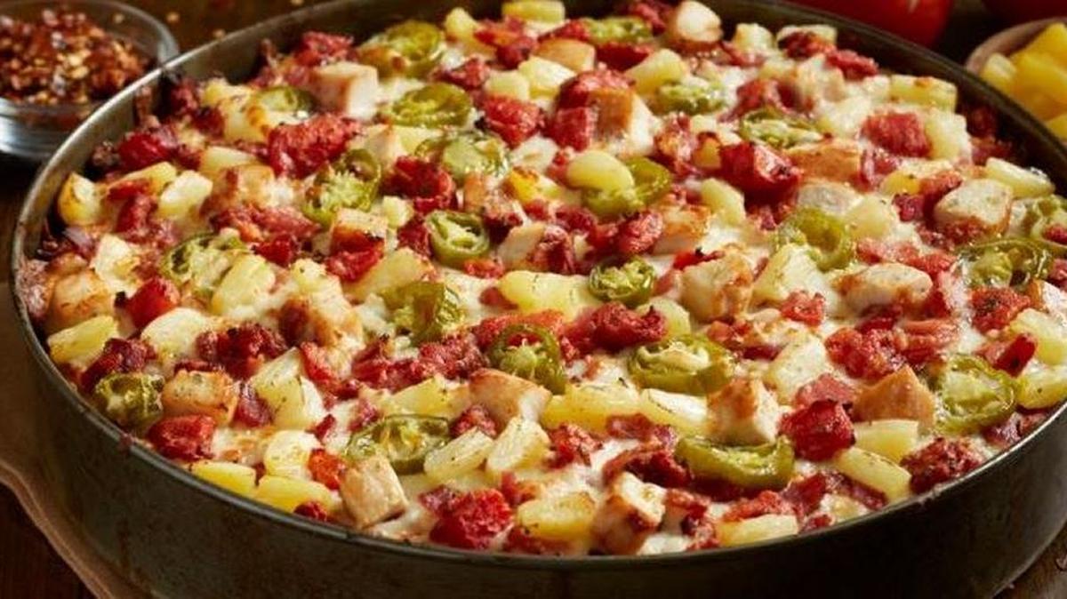 The spicy Hawaiian chicken pizza, one of BJ’s signature deep-dish pizzas.