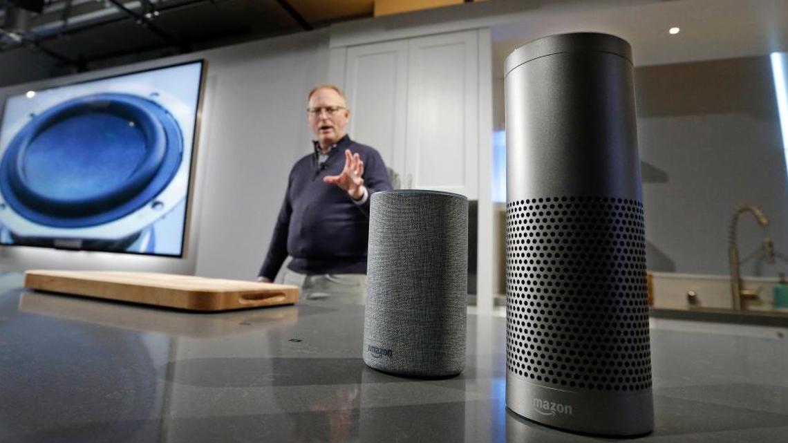 David Limp, senior vice president of Devices and Services at Amazon, displays a new Echo, left, and an Echo Plus during an event announcing several new Amazon products by the company in September, 2017, in Seattle.
