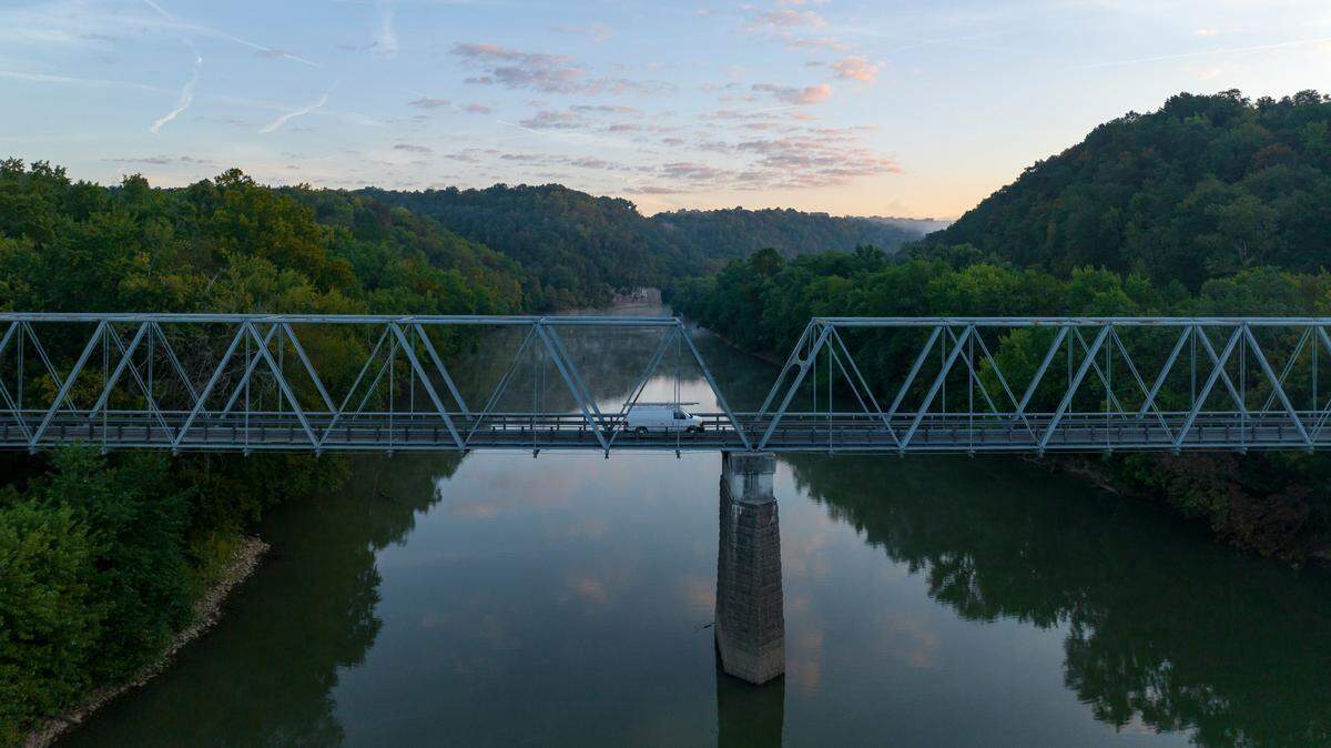 Old Clay’s Ferry Bridge crosses the Kentucky River at the Fayette and Madison county line in this 2023 photo. Volunteers are set to gather this weekend near Kelley’s Landing for a litter collection event on the river.