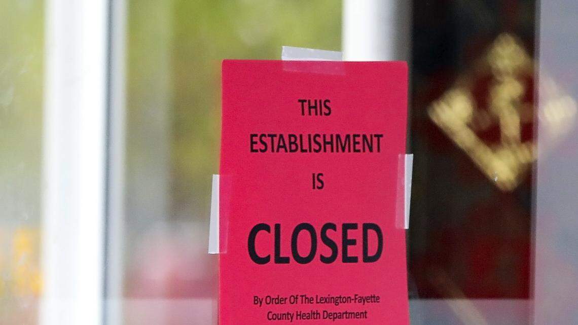 A closed sign placed by the Lexington-Fayette County Health Department on a Lexington restaurant after violations were found on the site.