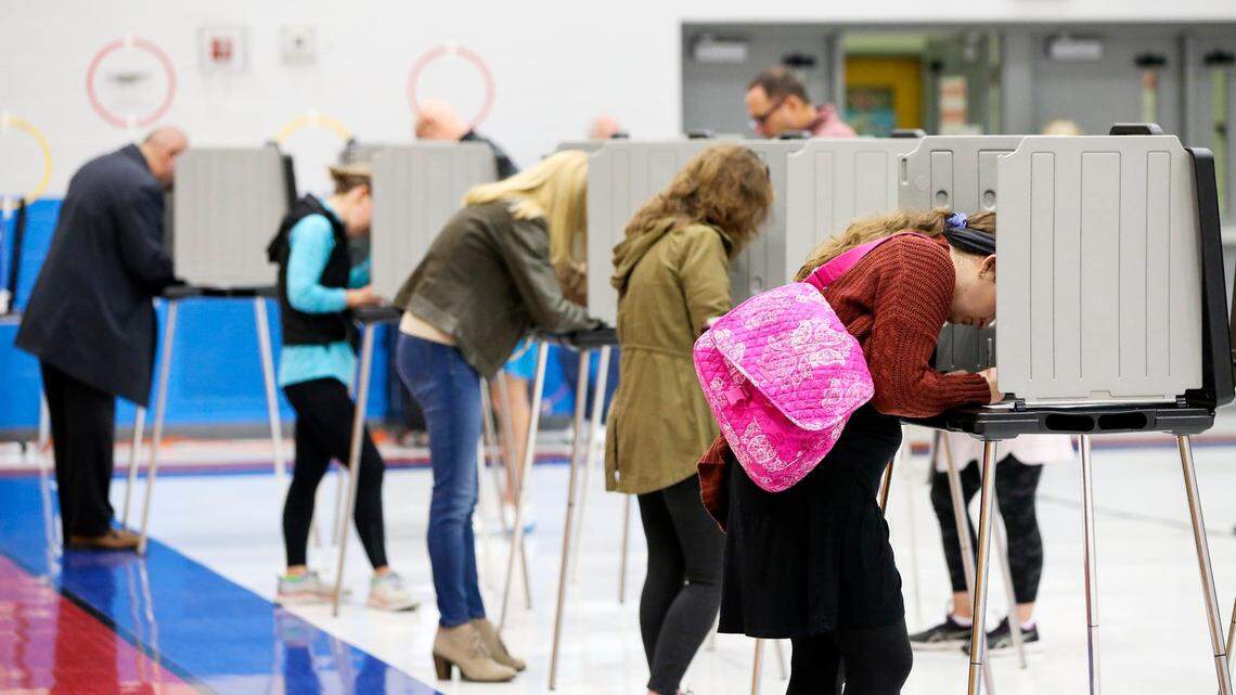 People vote at Veterans Park Elementary School in Lexington, on Election Day, Nov. 8, 2022.