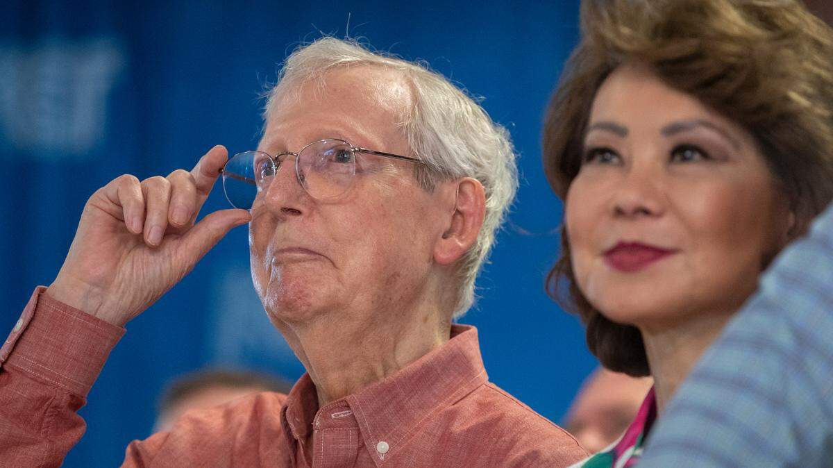 Senate Minority Leader Mitch McConnell (R-Ky.) and his wife, former U.S. secretary of labor and transportation Elaine Chao, attend the annual St. Jerome Fancy Farm Picnic in Fancy Farm, Ky., on Saturday, Aug. 5, 2023.during the annual St. Jerome Fancy Farm Picnic in Fancy Farm, Ky., on Saturday, Aug. 5, 2023.
