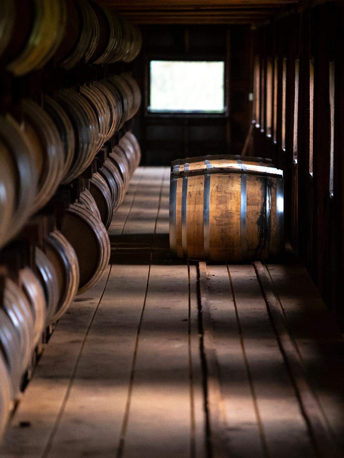 Bourbon barrels are aged in a warehouse at Maker’s Mark Distillery in Loretto, Ky., on Thursday, Aug. 10, 2023.