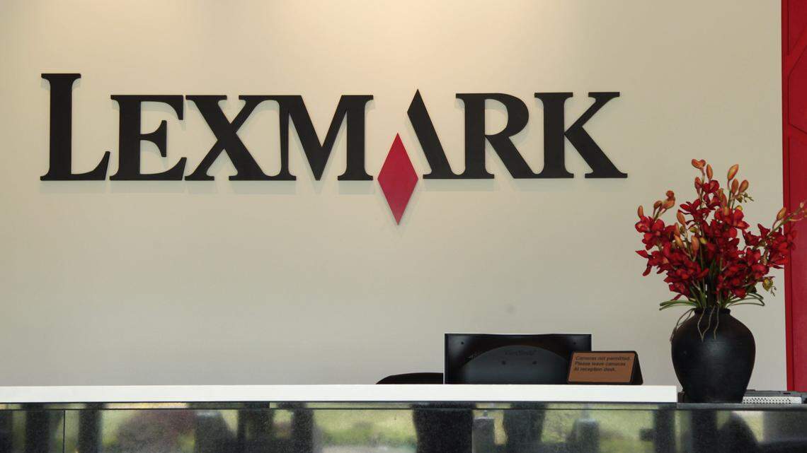 Logo behind reception desk at Lexmark in Lexington, Ky., on Aug. 28, 2012. Photo by Pablo Alcala | Staff